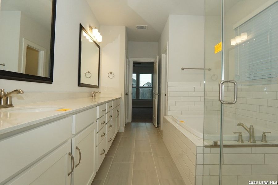 Furnished interior view inside a new home in Ladera - High Point 45', San Antonio (Image 13).