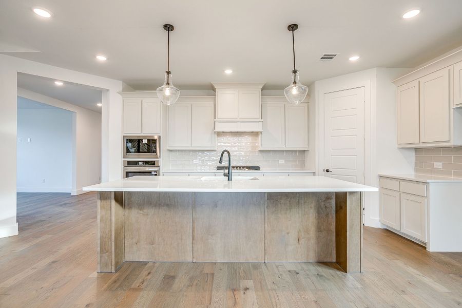 Representative furnished interior of a home built from the Valera by Graham Hart Home Builder in Bear Ridge, Burleson (Image 14).