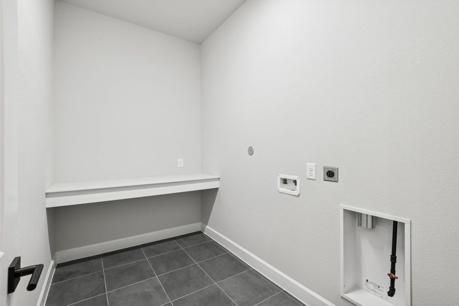 Spacious, unfurnished interior of a new home in Riceland 60’ Homesites, Mont Belvieu (Image 27). Spacious, unfurnished interior of a new home in Riceland 60’ Homesites, Mont Belvieu (Image 27).