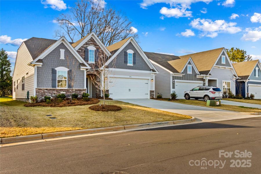 Front exterior of a new home in , Statesville, NC, highlighting curb appeal (Image 2). Front exterior of a new home in , Statesville, NC, highlighting curb appeal (Image 2).