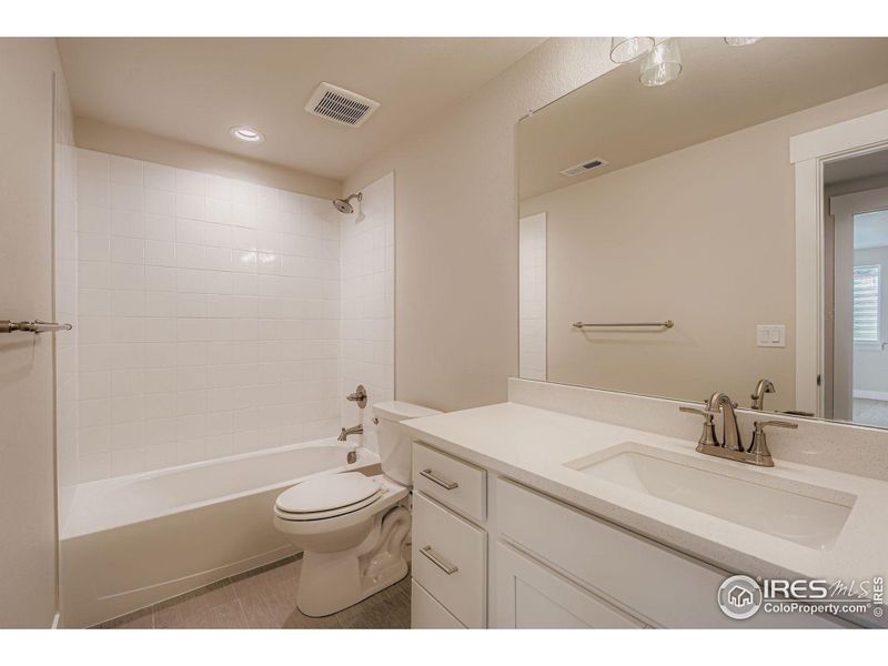 Furnished interior view inside a new home in RainDance National 60/70, Windsor (Image 13).