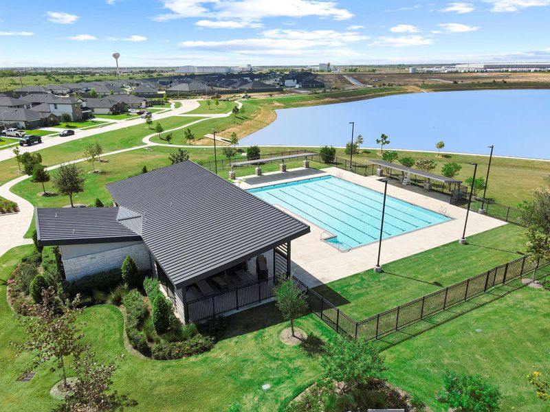 Resort-style community pool with spacious sun deck and shaded areas — ideal for summer relaxation and neighborhood gatherings. Resort-style community pool with spacious sun deck and shaded areas — ideal for summer relaxation and neighborhood gatherings.