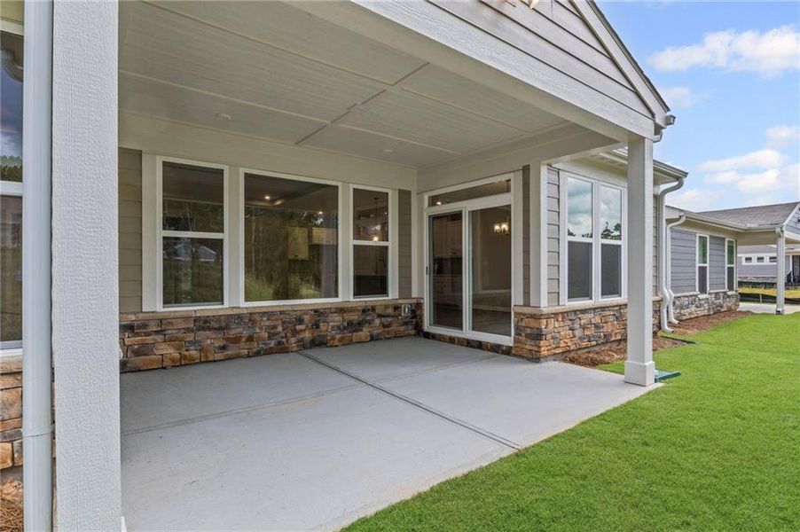 Front exterior of a new home in Laurel Farms, Dallas, GA, highlighting curb appeal (Image 35). Front exterior of a new home in Laurel Farms, Dallas, GA, highlighting curb appeal (Image 35).