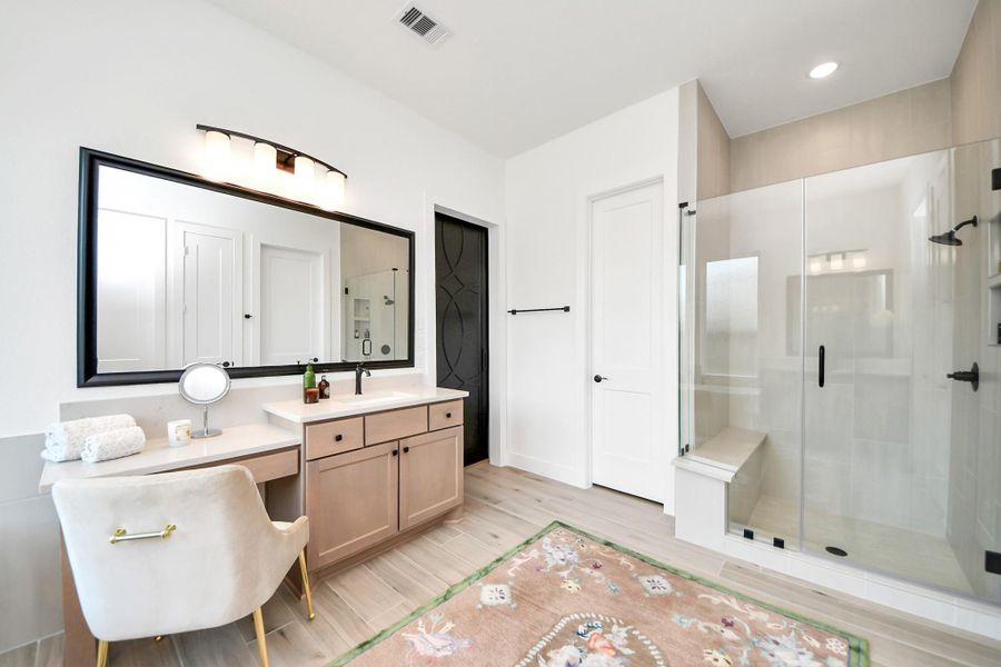 Primary bath with an elevated vanity area Primary bath with an elevated vanity area