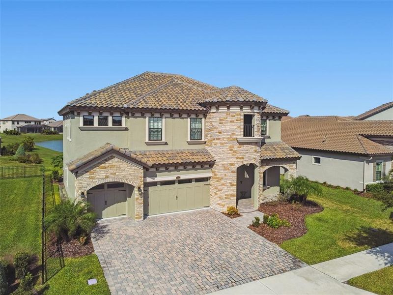 Front exterior of a new home in Mirada, San Antonio, FL, highlighting curb appeal (Image 24).