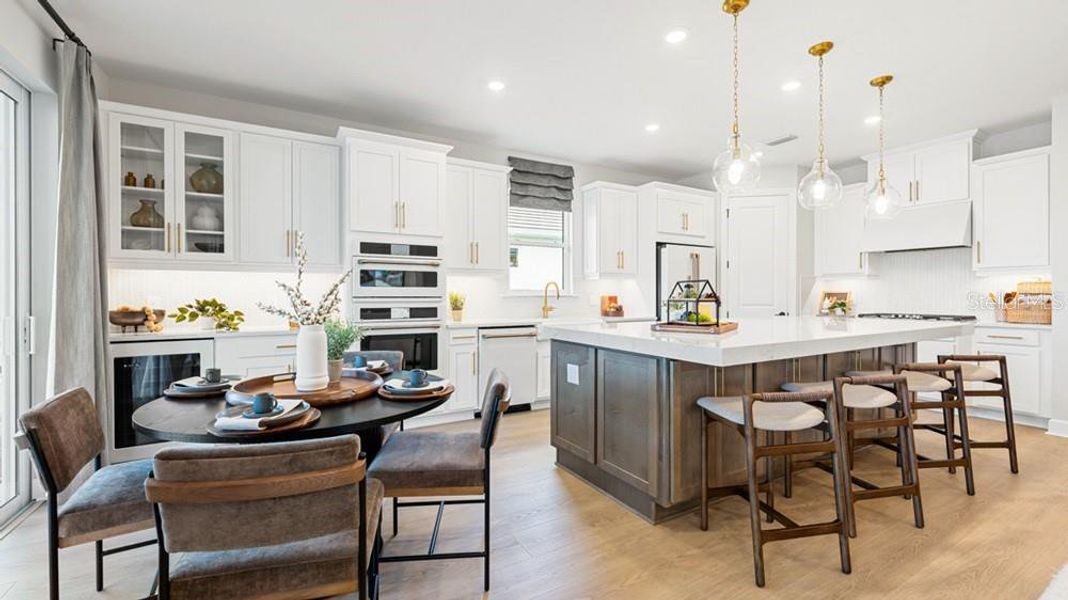 Furnished interior view inside a new home in Esplanade at Starling, Punta Gorda (Image 6).