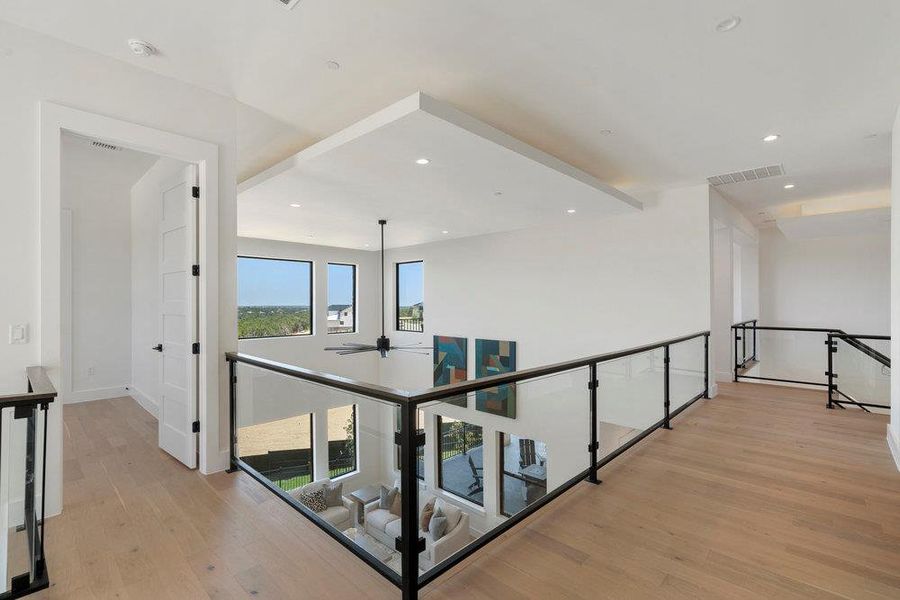 Furnished interior view inside a new home in Milky Way at River Place, Austin (Image 30).