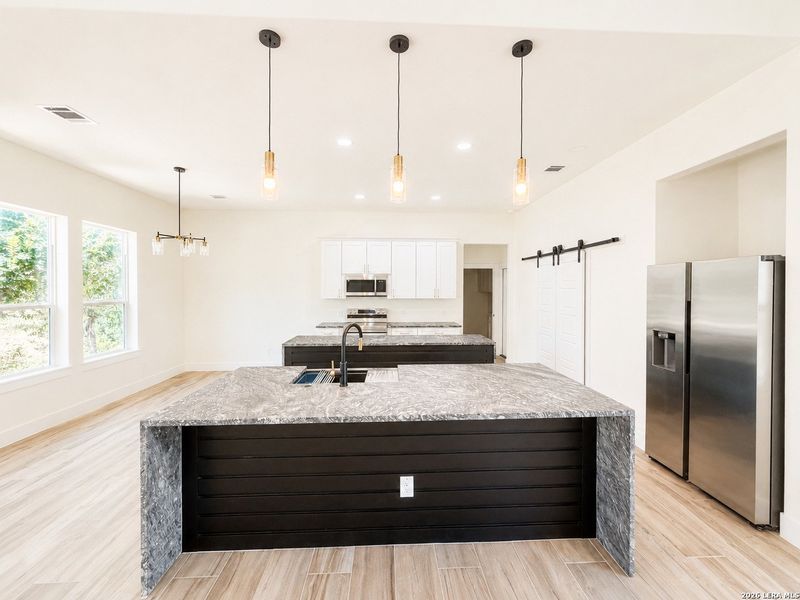 Furnished interior view inside a new home in , Bulverde (Image 6).