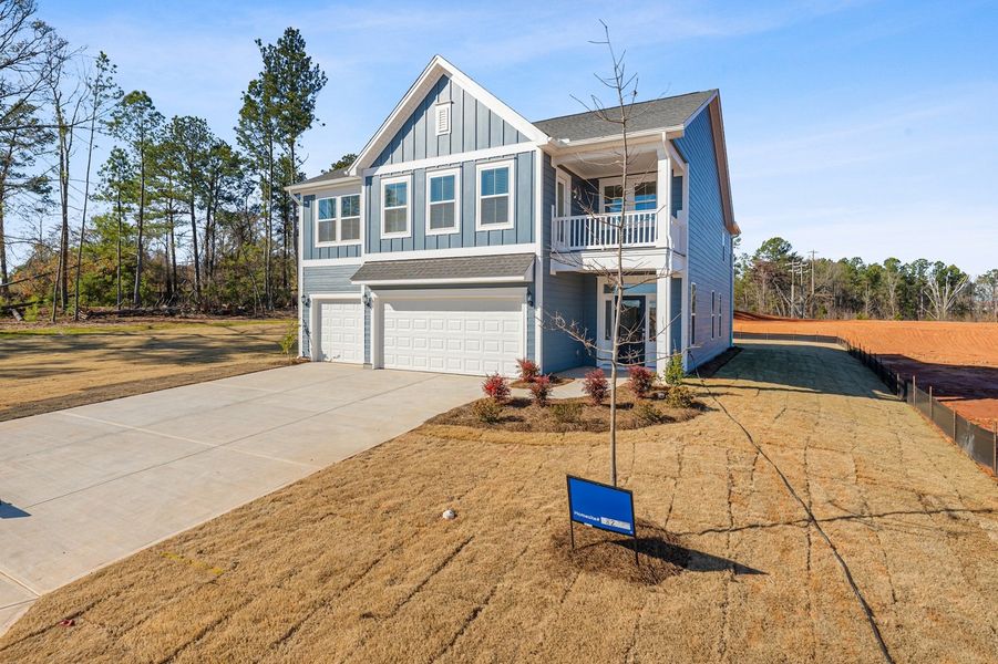 Front exterior of a new home in Cottages at Lake Emory, Inman, SC, highlighting curb appeal (Image 20).