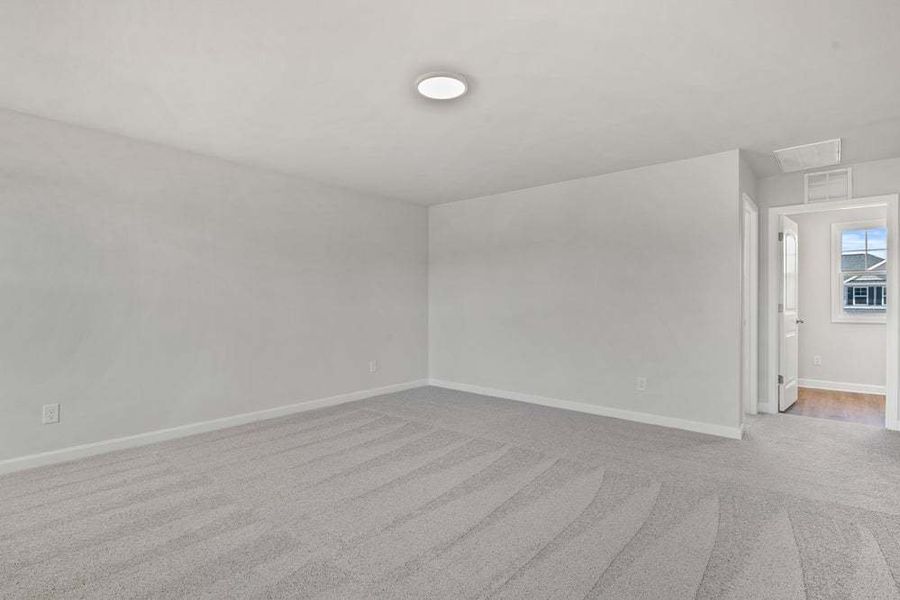 Representative unfurnished interior of a home built from the Camellia by Caviness & Cates Communities in Bartlett Manor, Youngsville (Image 51).