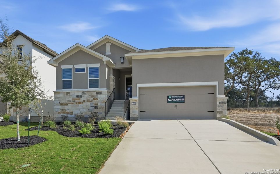 Front exterior of a new home in Esperanza – New Phase Now Selling, Boerne, TX, highlighting curb appeal (Image 21).
