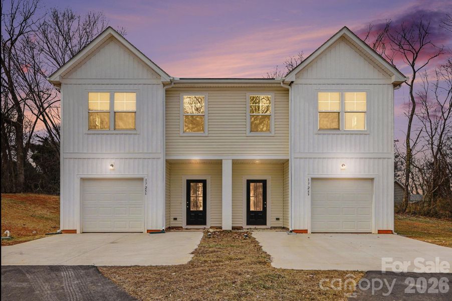 Front exterior of a new home in , Statesville, NC, highlighting curb appeal (Image 19).