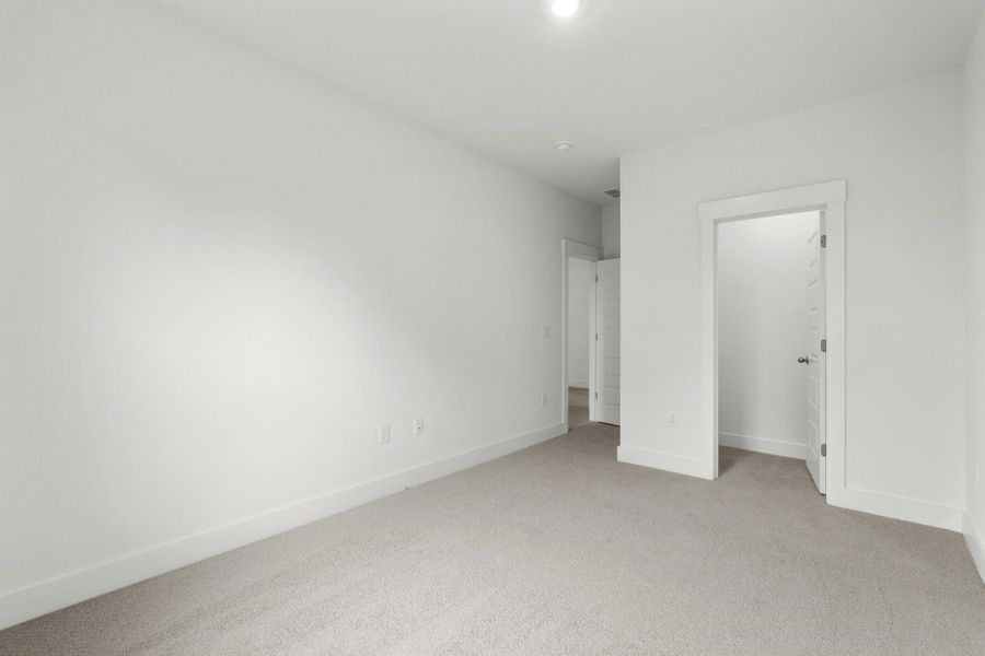 Spacious, unfurnished interior of a new home in Long Bay Golf Club, Longs (Image 38).