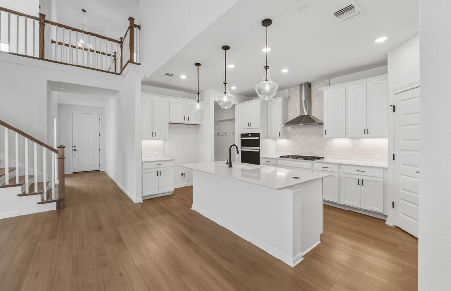 Furnished interior view inside a new home in Bluffview Reserve, Leander (Image 9).