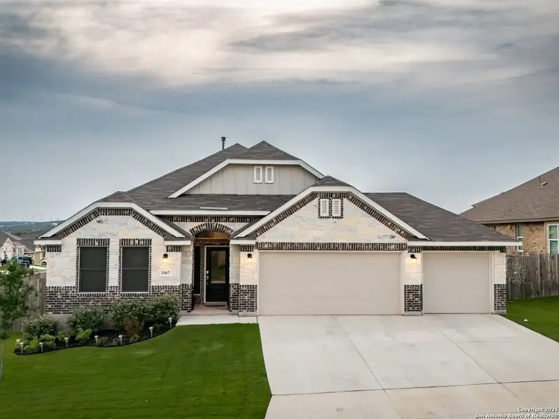 Front exterior of a new home in , Bulverde, TX, highlighting curb appeal (Image 1). Front exterior of a new home in , Bulverde, TX, highlighting curb appeal (Image 1).