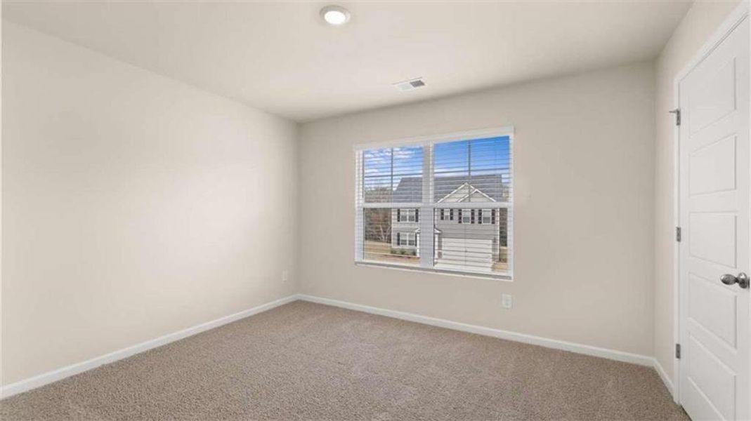 Spacious, unfurnished interior of a new home in The Preserve at Agricultural Village, Perry (Image 14).