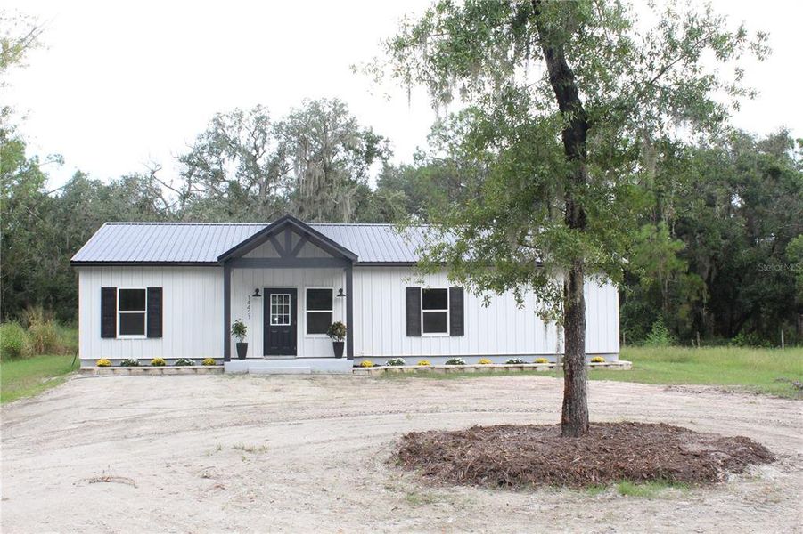 Front exterior of a new home in , Parrish, FL, highlighting curb appeal (Image 2). Front exterior of a new home in , Parrish, FL, highlighting curb appeal (Image 2).