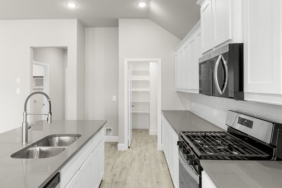 Representative exterior photo of a completed home built from the Chester by Impression Homes in Arcadia Trails, Balch Springs, TX (Image 8).