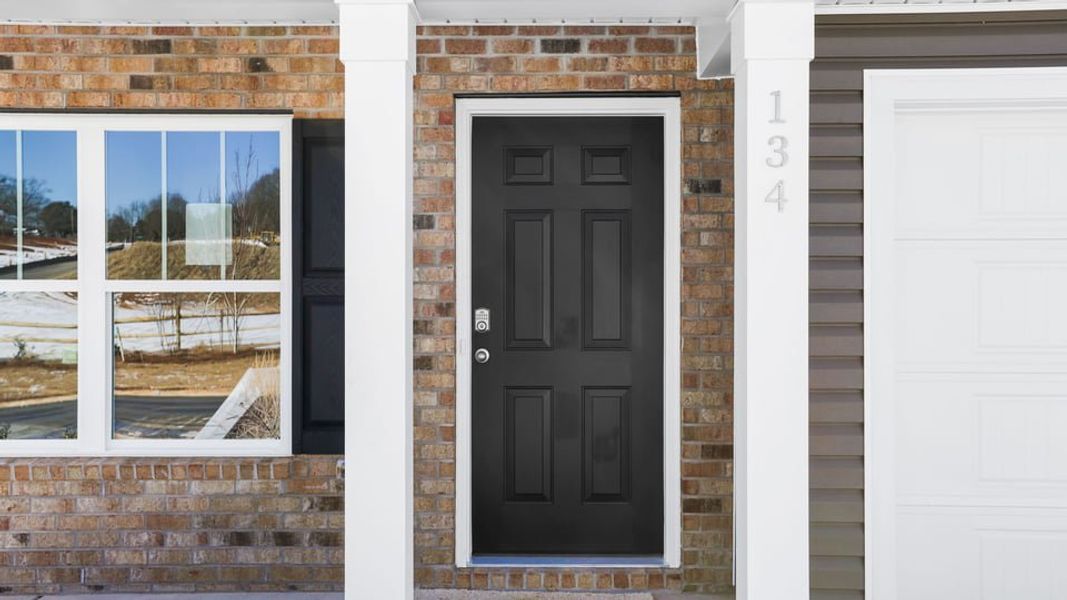 Exterior details and patio area of a home in Village Grove, Greenville (Image 3).