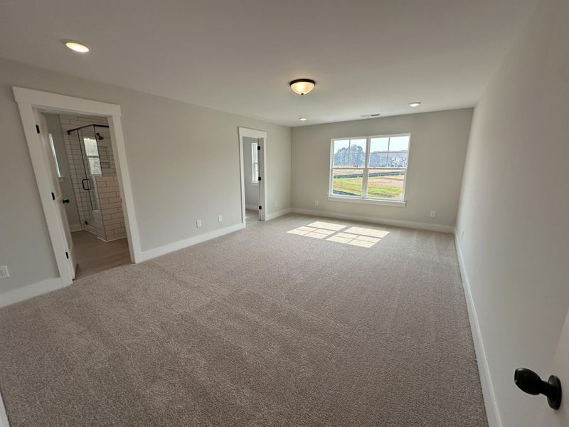 Spacious, unfurnished interior of a new home in Blythe Mill Townhomes, Waxhaw (Image 20).