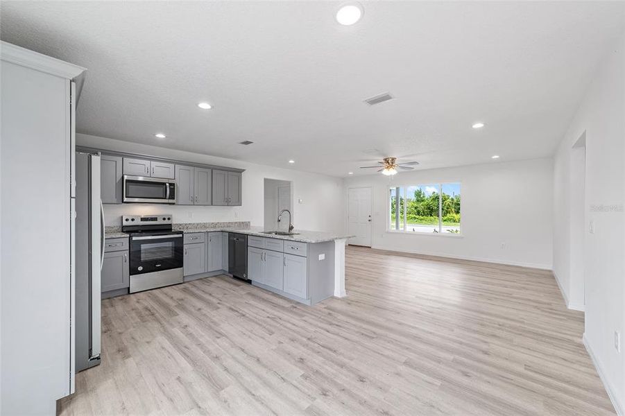 Furnished interior view inside a new home in , Dunnellon (Image 12).