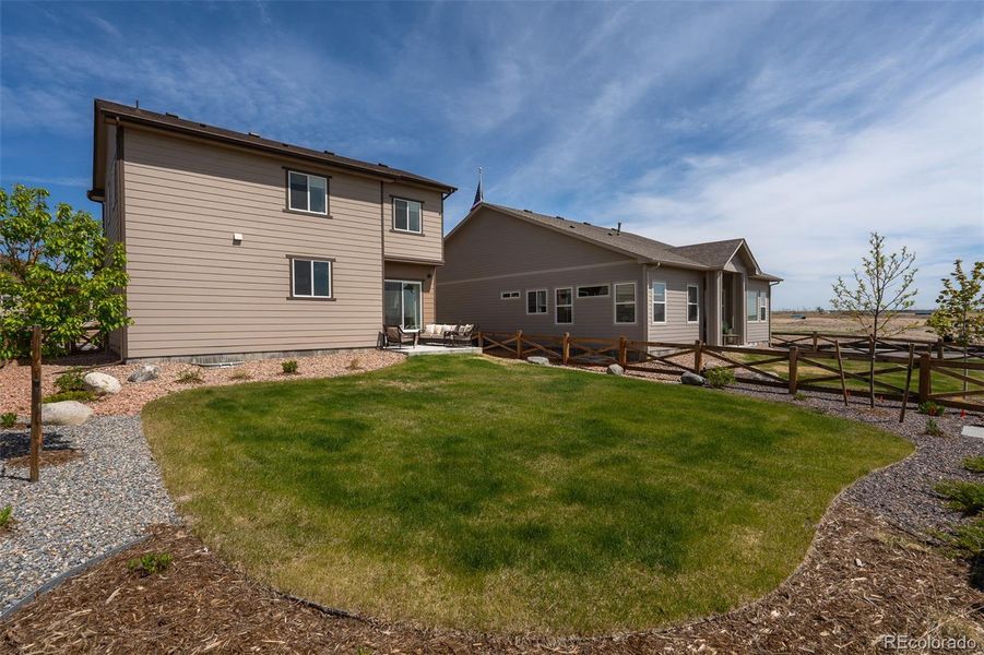 Front exterior of a new home in , Colorado Springs, CO, highlighting curb appeal (Image 19).