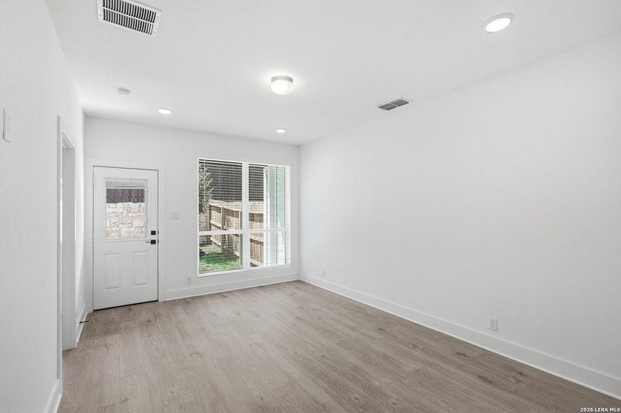 Spacious, unfurnished interior of a new home in Centero at Stone Oak, San Antonio (Image 28).