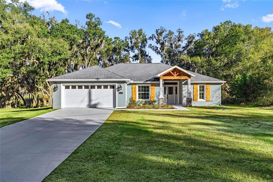 Front exterior of a new home in , Dunnellon, FL, highlighting curb appeal (Image 24).