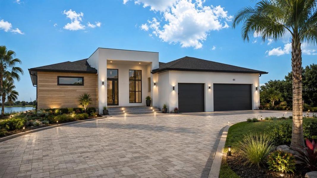 Front exterior of a new home in , Placida, FL, highlighting curb appeal (Image 4). Front exterior of a new home in , Placida, FL, highlighting curb appeal (Image 4).