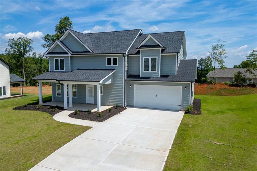 Front exterior of a new home in , Toccoa, GA, highlighting curb appeal (Image 24). Front exterior of a new home in , Toccoa, GA, highlighting curb appeal (Image 24).