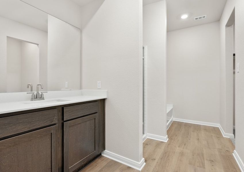 The master bathroom has a nice vanity space. The master bathroom has a nice vanity space.