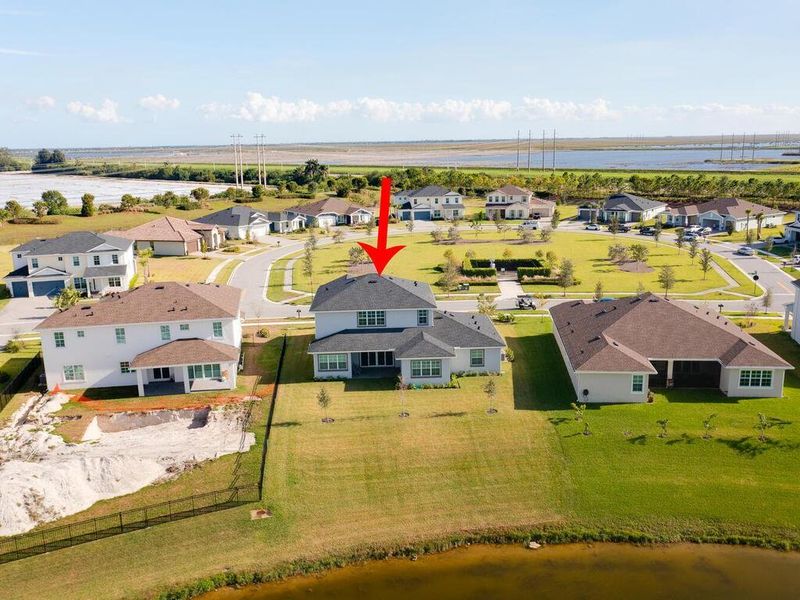 Front exterior of a new home in , The Acreage, FL, highlighting curb appeal (Image 20). Front exterior of a new home in , The Acreage, FL, highlighting curb appeal (Image 20).