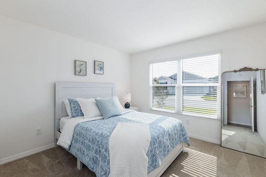 Furnished interior view inside a new home in , The Villages (Image 11).