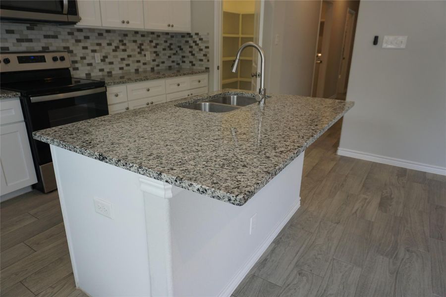 Furnished interior view inside a new home in , Willis (Image 3).