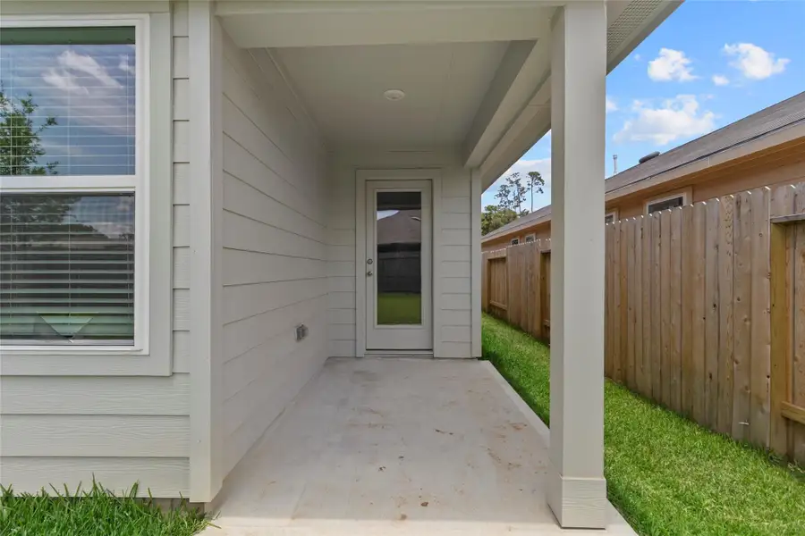 Exterior details and patio area of a home in Venetian Pines, Conroe (Image 3). Exterior details and patio area of a home in Venetian Pines, Conroe (Image 3).