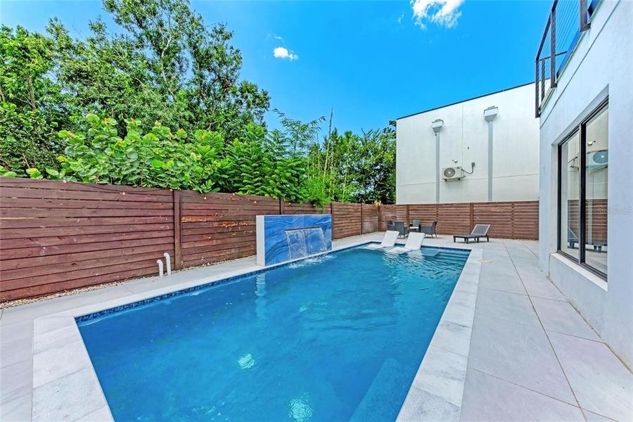 Front exterior of a new home in , Sarasota, FL, highlighting curb appeal (Image 27).