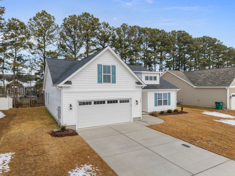 Front exterior of a new home in Davenport Farms, Winterville, NC, highlighting curb appeal (Image 24).