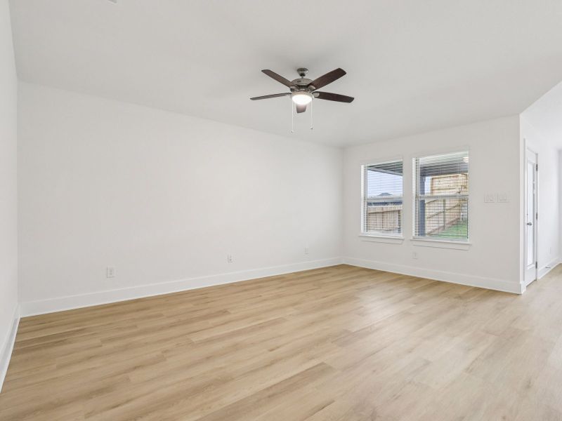 Living room in the Callaghan floorplan at a Meritage Homes community.