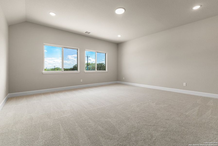 Spacious, unfurnished interior of a new home in The Enclave at Potranco Oaks, Castroville (Image 24).