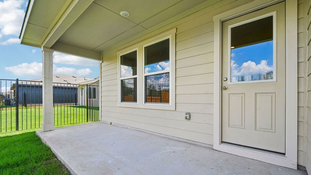 Exterior details and patio area of a home in Trails at Wildhorse, Austin (Image 23).