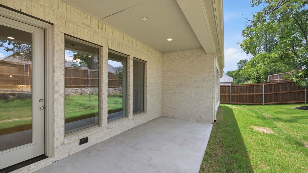 Exterior details and patio area of a home in Trinity Falls, McKinney (Image 4).