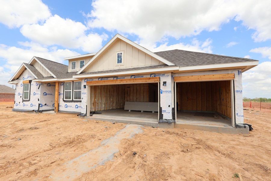 One-story home with 4 bedrooms, 3.5 baths and 4 car tandem garage