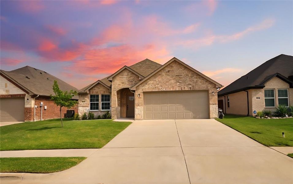Front exterior of a new home in , Greenville, TX, highlighting curb appeal (Image 2). Front exterior of a new home in , Greenville, TX, highlighting curb appeal (Image 2).