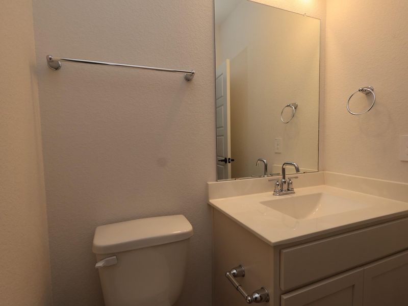 Furnished interior view inside a new home in Sorella, Tomball (Image 7).