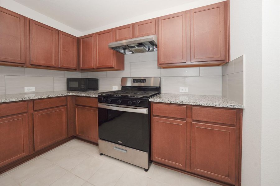 Furnished interior view inside a new home in , Katy (Image 5).