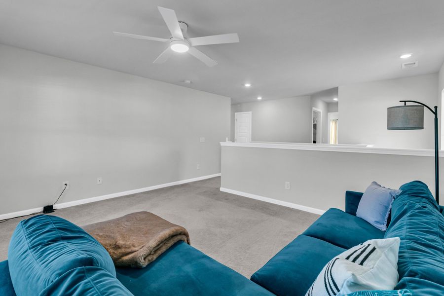 Furnished interior view inside a new home in Sweetgrass at Summers Corner: Arbor Collection, Summerville (Image 14). Furnished interior view inside a new home in Sweetgrass at Summers Corner: Arbor Collection, Summerville (Image 14).