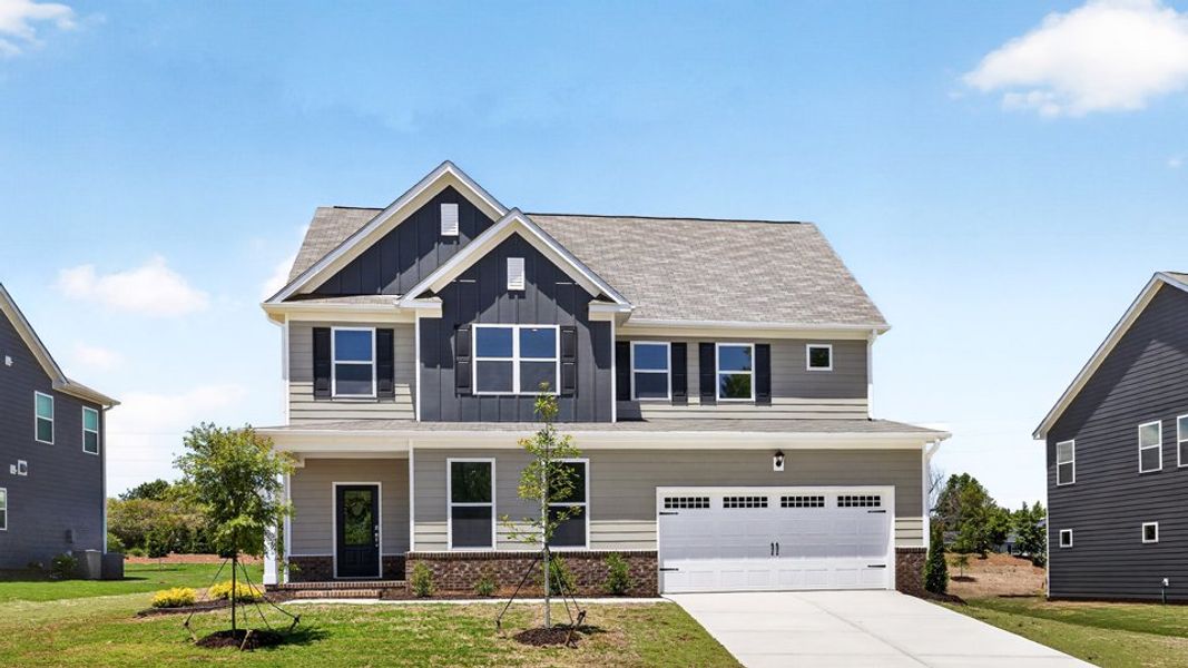 Representative exterior photo of a completed home built from the Lucas by D.R. Horton in The Manors at Haywood Glen, Knightdale, NC (Image 32). Representative exterior photo of a completed home built from the Lucas by D.R. Horton in The Manors at Haywood Glen, Knightdale, NC (Image 32).