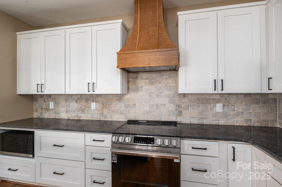 Custom wood hood vent.