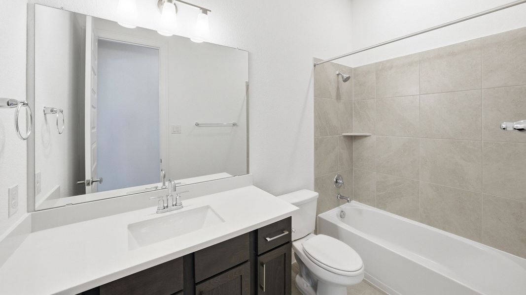 Furnished interior view inside a new home in Oaks at San Gabriel, Georgetown (Image 13).