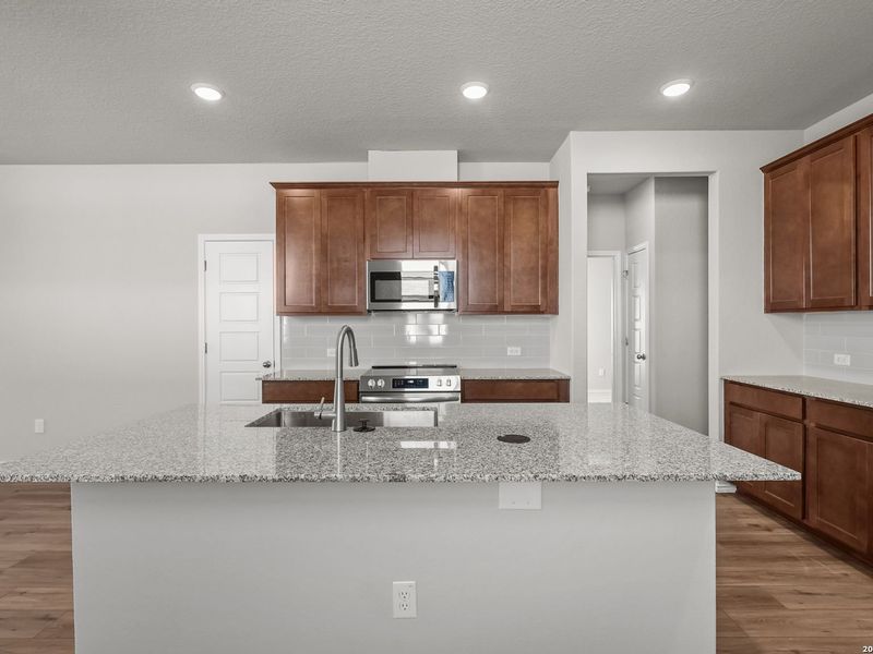 Furnished interior view inside a new home in Applewhite Meadows, San Antonio (Image 8). Furnished interior view inside a new home in Applewhite Meadows, San Antonio (Image 8).